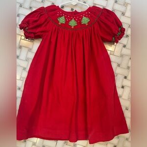 Red Dress smocked with Christmas trees. Perfect for any Holiday occasion! 9M